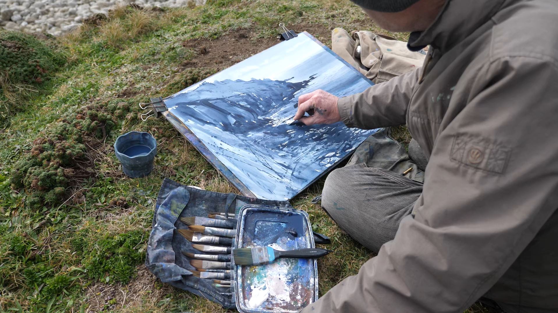 Overhead shot of Paul Lewin's brushes and work in progress